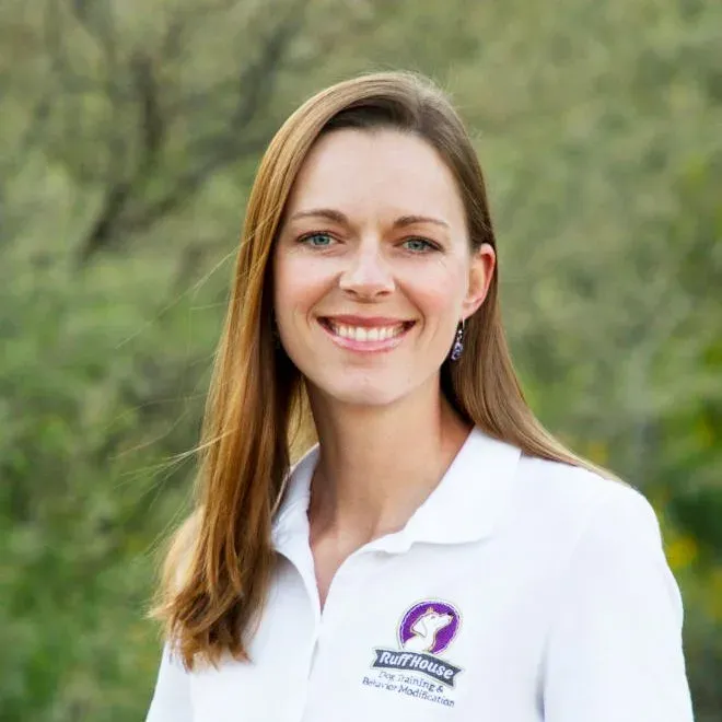 Crystal Blaker, lead dog trainer, in a Ruff House polo